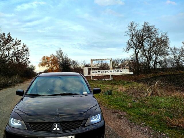Чорний Міцубісі Lancer, об'ємом двигуна 1.6 л та пробігом 240 тис. км за 4000 $, фото 1 на Automoto.ua