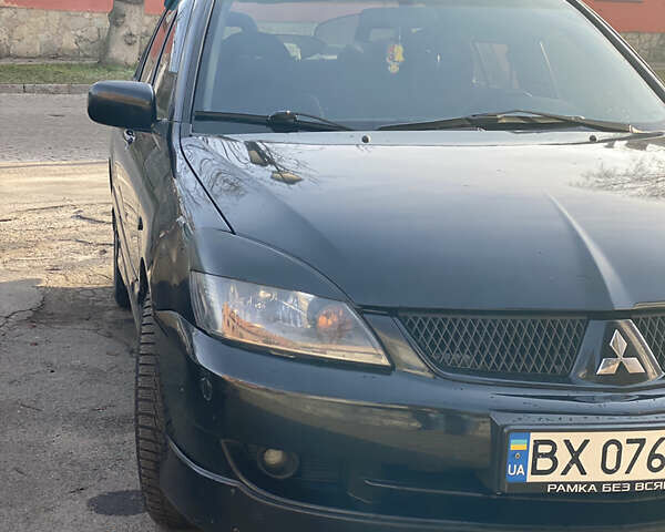 Чорний Міцубісі Lancer, об'ємом двигуна 2 л та пробігом 273 тис. км за 4950 $, фото 1 на Automoto.ua