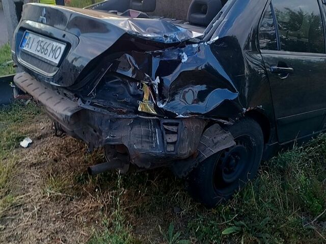 Чорний Міцубісі Lancer, об'ємом двигуна 1.6 л та пробігом 290 тис. км за 2500 $, фото 1 на Automoto.ua