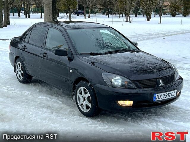 Чорний Міцубісі Lancer, об'ємом двигуна 1.6 л та пробігом 270 тис. км за 2900 $, фото 1 на Automoto.ua