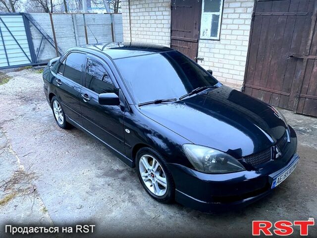 Чорний Міцубісі Lancer, об'ємом двигуна 2 л та пробігом 347 тис. км за 5200 $, фото 1 на Automoto.ua
