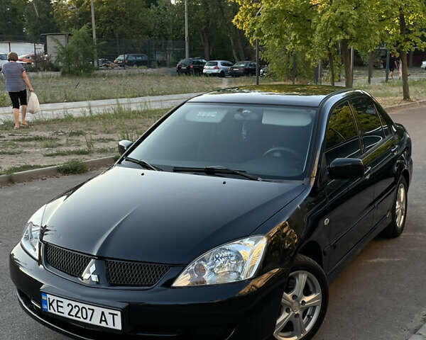 Мицубиси Лансер 2006 в Днепре (Днепропетровске) на Automoto.ua Черный Мицубиси Лансер, объемом двигателя 1.58 л и пробегом 166 тыс. км за 4800 $, фото 1 на Automoto.ua