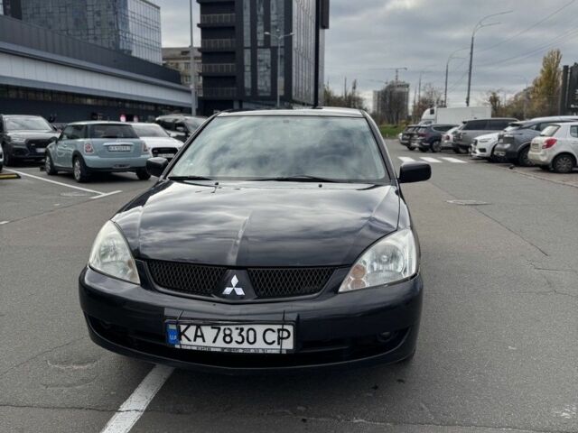Черный Мицубиси Лансер, объемом двигателя 0 л и пробегом 319 тыс. км за 2700 $, фото 1 на Automoto.ua
