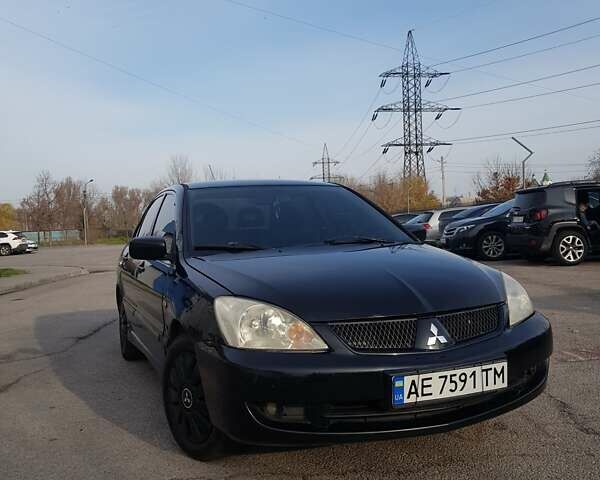 Чорний Міцубісі Lancer, об'ємом двигуна 1.58 л та пробігом 290 тис. км за 3200 $, фото 1 на Automoto.ua