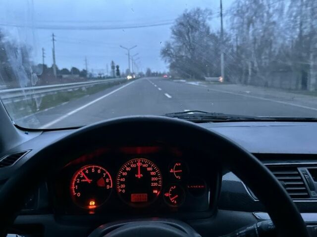 Черный Мицубиси Лансер, объемом двигателя 1.6 л и пробегом 3 тыс. км за 4000 $, фото 1 на Automoto.ua