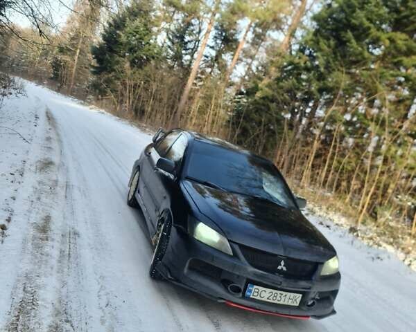 Черный Мицубиси Лансер, объемом двигателя 0 л и пробегом 246 тыс. км за 4900 $, фото 1 на Automoto.ua