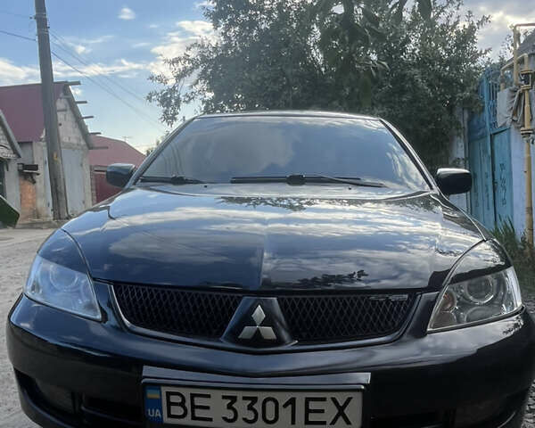 Чорний Міцубісі Lancer, об'ємом двигуна 1.6 л та пробігом 200 тис. км за 4300 $, фото 1 на Automoto.ua