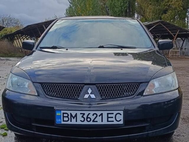 Чорний Міцубісі Lancer, об'ємом двигуна 1.6 л та пробігом 250 тис. км за 4000 $, фото 1 на Automoto.ua