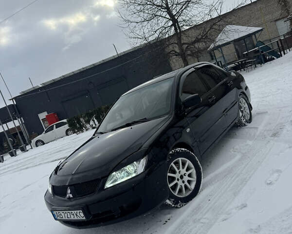 Чорний Міцубісі Lancer, об'ємом двигуна 1.58 л та пробігом 340 тис. км за 3550 $, фото 1 на Automoto.ua