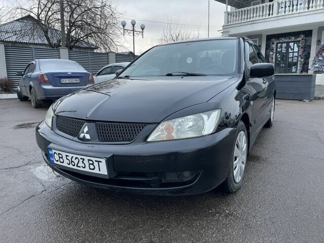 Черный Мицубиси Лансер, объемом двигателя 0 л и пробегом 196 тыс. км за 3800 $, фото 1 на Automoto.ua