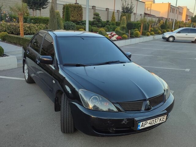 Чорний Міцубісі Lancer, об'ємом двигуна 1.6 л та пробігом 280 тис. км за 4014 $, фото 1 на Automoto.ua