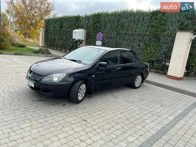 Чорний Міцубісі Lancer, об'ємом двигуна 1.6 л та пробігом 280 тис. км за 2300 $, фото 1 на Automoto.ua