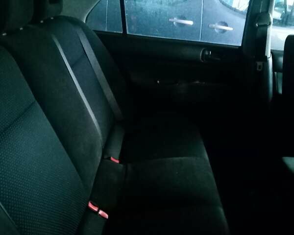 Чорний Міцубісі Lancer, об'ємом двигуна 1.6 л та пробігом 256 тис. км за 1600 $, фото 1 на Automoto.ua