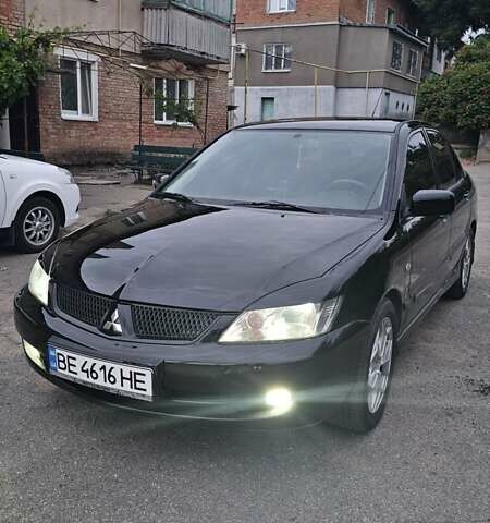 Чорний Міцубісі Lancer, об'ємом двигуна 1.6 л та пробігом 350 тис. км за 4950 $, фото 1 на Automoto.ua