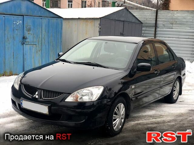 Чорний Міцубісі Lancer, об'ємом двигуна 1.6 л та пробігом 181 тис. км за 5400 $, фото 1 на Automoto.ua