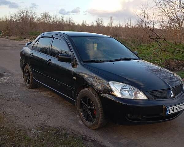 Чорний Міцубісі Lancer, об'ємом двигуна 1.6 л та пробігом 325 тис. км за 4750 $, фото 1 на Automoto.ua
