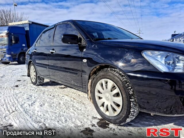 Чорний Міцубісі Lancer, об'ємом двигуна 1.6 л та пробігом 33000 тис. км за 4100 $, фото 1 на Automoto.ua