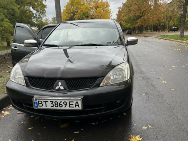 Чорний Міцубісі Lancer, об'ємом двигуна 1.6 л та пробігом 380 тис. км за 4900 $, фото 1 на Automoto.ua