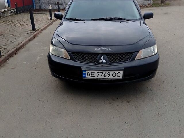 Чорний Міцубісі Lancer, об'ємом двигуна 1.6 л та пробігом 218 тис. км за 4444 $, фото 1 на Automoto.ua