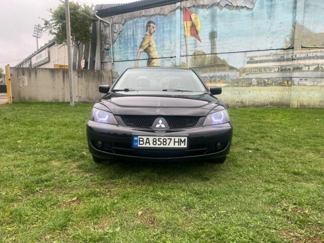 Чорний Міцубісі Lancer, об'ємом двигуна 1.6 л та пробігом 178 тис. км за 5199 $, фото 1 на Automoto.ua
