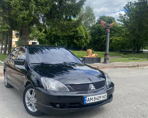 Чорний Міцубісі Lancer, об'ємом двигуна 2 л та пробігом 183 тис. км за 4500 $, фото 1 на Automoto.ua