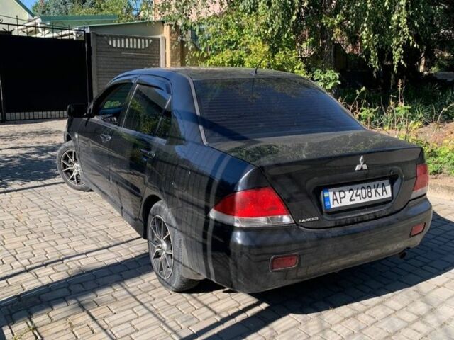 Черный Мицубиси Лансер, объемом двигателя 0 л и пробегом 300 тыс. км за 4300 $, фото 1 на Automoto.ua