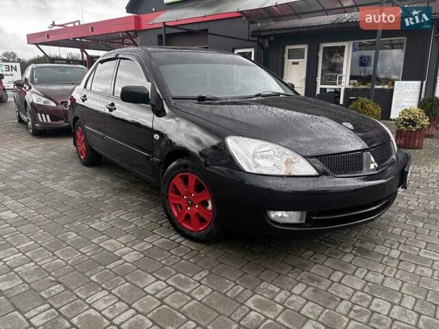 Чорний Міцубісі Lancer, об'ємом двигуна 1.6 л та пробігом 350 тис. км за 3300 $, фото 1 на Automoto.ua