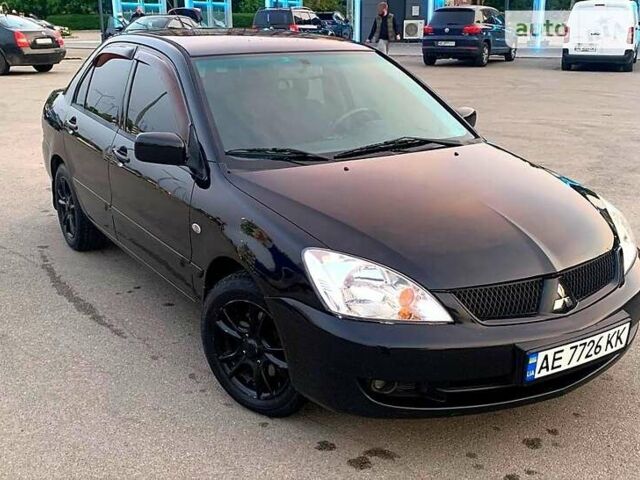 Чорний Міцубісі Lancer, об'ємом двигуна 1.6 л та пробігом 224 тис. км за 5100 $, фото 1 на Automoto.ua