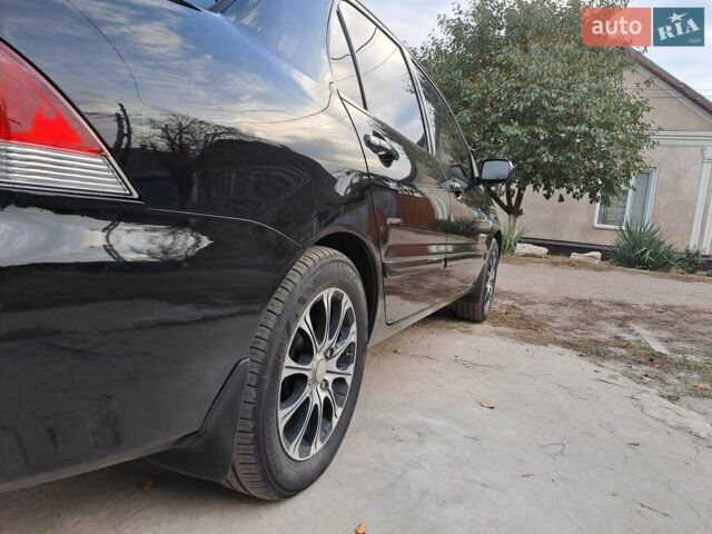 Чорний Міцубісі Lancer, об'ємом двигуна 1.6 л та пробігом 170 тис. км за 6000 $, фото 1 на Automoto.ua