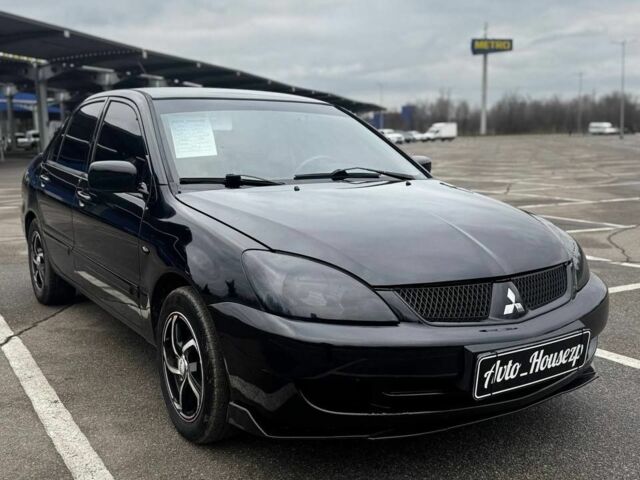 Чорний Міцубісі Lancer, об'ємом двигуна 0 л та пробігом 236 тис. км за 3600 $, фото 1 на Automoto.ua