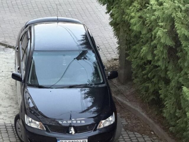 Чорний Міцубісі Lancer, об'ємом двигуна 1.6 л та пробігом 284 тис. км за 2098 $, фото 1 на Automoto.ua