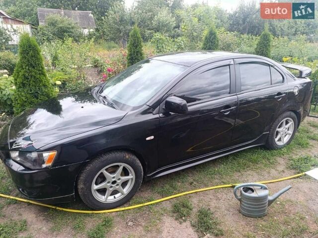 Чорний Міцубісі Lancer, об'ємом двигуна 2 л та пробігом 230 тис. км за 5200 $, фото 1 на Automoto.ua