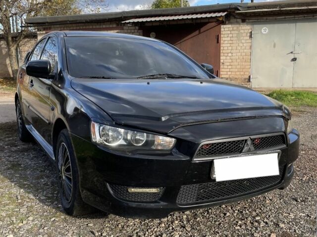 Мицубиси Лансер 2007 в Кривом Роге на Automoto.ua Черный Мицубиси Лансер, объемом двигателя 1.5 л и пробегом 150 тыс. км за 6500 $, фото 1 на Automoto.ua