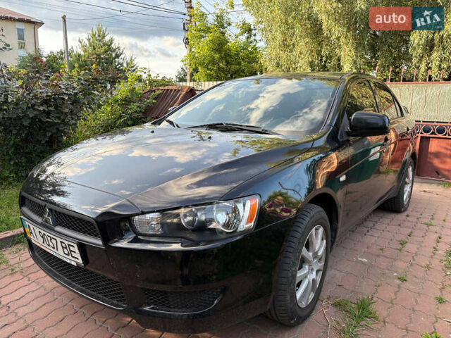 Черный Мицубиси Лансер, объемом двигателя 1.5 л и пробегом 111 тыс. км за 7500 $, фото 1 на Automoto.ua