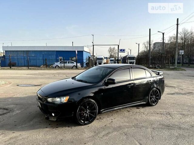 Чорний Міцубісі Lancer, об'ємом двигуна 2 л та пробігом 274 тис. км за 6900 $, фото 1 на Automoto.ua