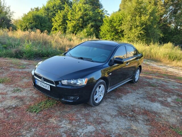 Чорний Міцубісі Lancer, об'ємом двигуна 2 л та пробігом 230 тис. км за 6203 $, фото 1 на Automoto.ua