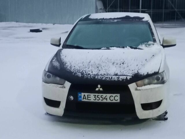 Черный Мицубиси Лансер, объемом двигателя 2 л и пробегом 350 тыс. км за 5500 $, фото 1 на Automoto.ua