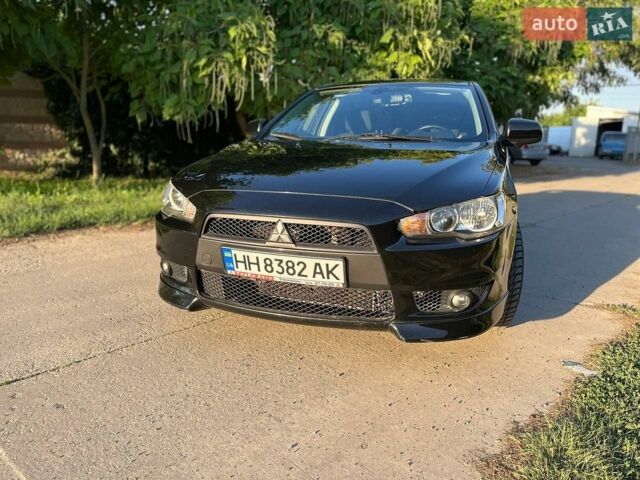 Чорний Міцубісі Lancer, об'ємом двигуна 2 л та пробігом 182 тис. км за 6600 $, фото 1 на Automoto.ua