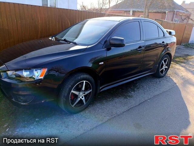 Чорний Міцубісі Lancer, об'ємом двигуна 20 л та пробігом 281 тис. км за 5300 $, фото 1 на Automoto.ua