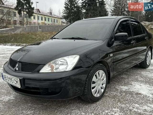 Чорний Міцубісі Lancer, об'ємом двигуна 1.6 л та пробігом 160 тис. км за 4600 $, фото 1 на Automoto.ua