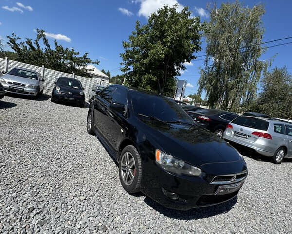 Чорний Міцубісі Lancer, об'ємом двигуна 2 л та пробігом 253 тис. км за 6400 $, фото 1 на Automoto.ua