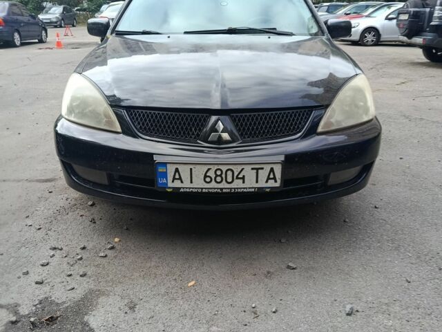 Чорний Міцубісі Lancer, об'ємом двигуна 1.6 л та пробігом 420 тис. км за 3650 $, фото 1 на Automoto.ua