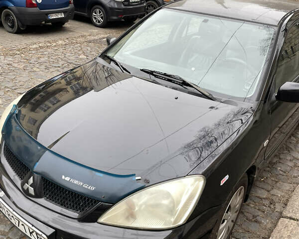 Чорний Міцубісі Lancer, об'ємом двигуна 1.6 л та пробігом 213 тис. км за 3000 $, фото 1 на Automoto.ua