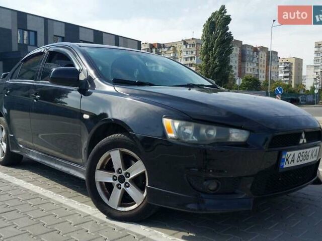 Чорний Міцубісі Lancer, об'ємом двигуна 2 л та пробігом 194 тис. км за 6500 $, фото 1 на Automoto.ua