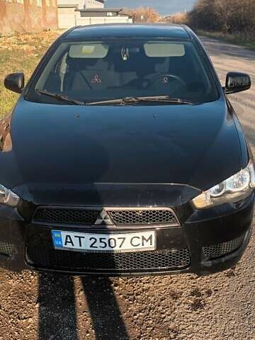 Черный Мицубиси Лансер, объемом двигателя 1.5 л и пробегом 270 тыс. км за 4999 $, фото 1 на Automoto.ua