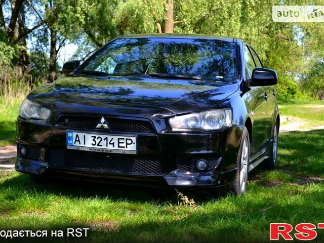 Чорний Міцубісі Lancer, об'ємом двигуна 1.8 л та пробігом 226 тис. км за 6600 $, фото 1 на Automoto.ua