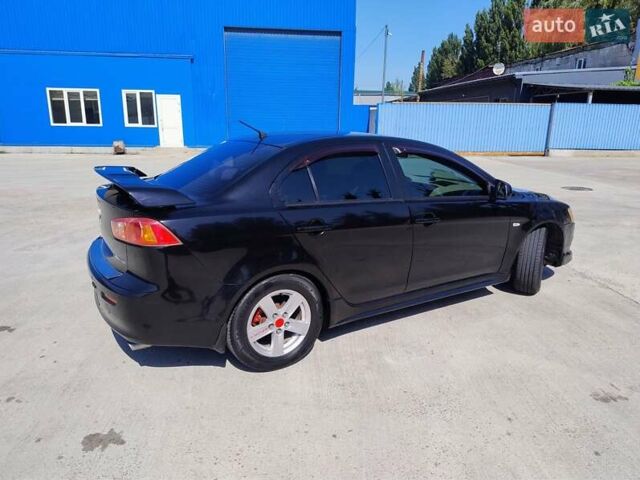 Чорний Міцубісі Lancer, об'ємом двигуна 2 л та пробігом 268 тис. км за 5000 $, фото 1 на Automoto.ua
