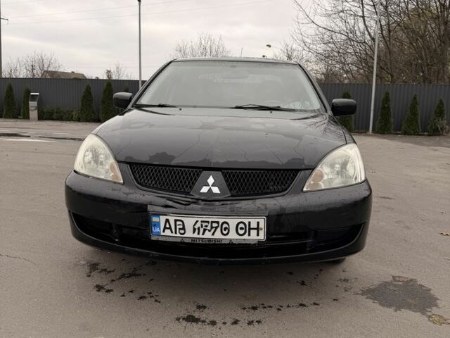Черный Мицубиси Лансер, объемом двигателя 0 л и пробегом 240 тыс. км за 3300 $, фото 1 на Automoto.ua