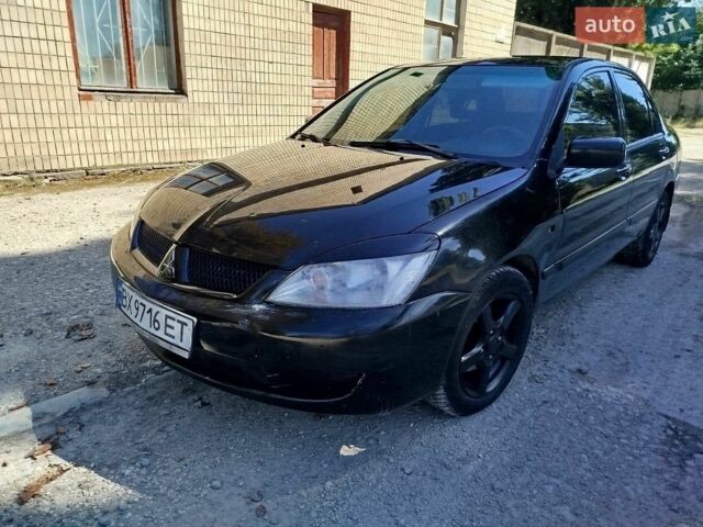 Чорний Міцубісі Lancer, об'ємом двигуна 1.58 л та пробігом 250 тис. км за 2900 $, фото 1 на Automoto.ua