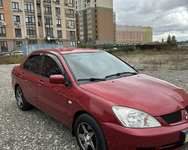 Чорний Міцубісі Lancer, об'ємом двигуна 1.6 л та пробігом 195 тис. км за 5000 $, фото 1 на Automoto.ua